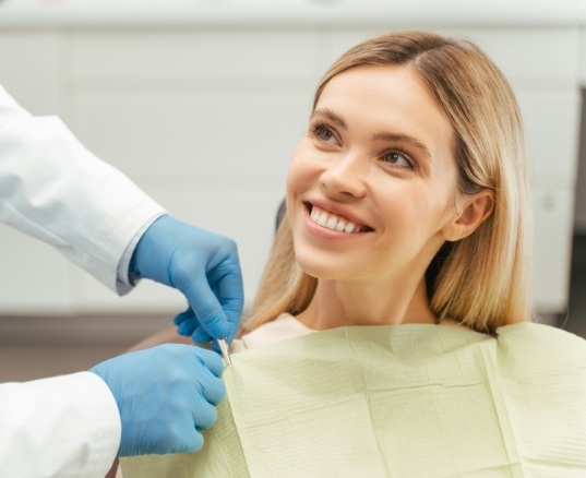 patient smiling in chair