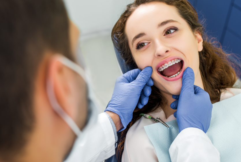 Patient with braces in dental chair